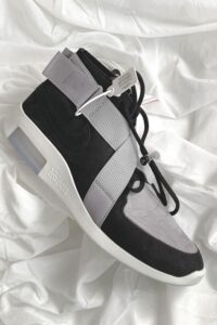 Black and White Nike Sneaker on a White Textile