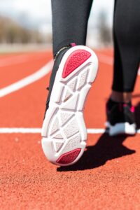 White and Pink Sole of a Running shoes